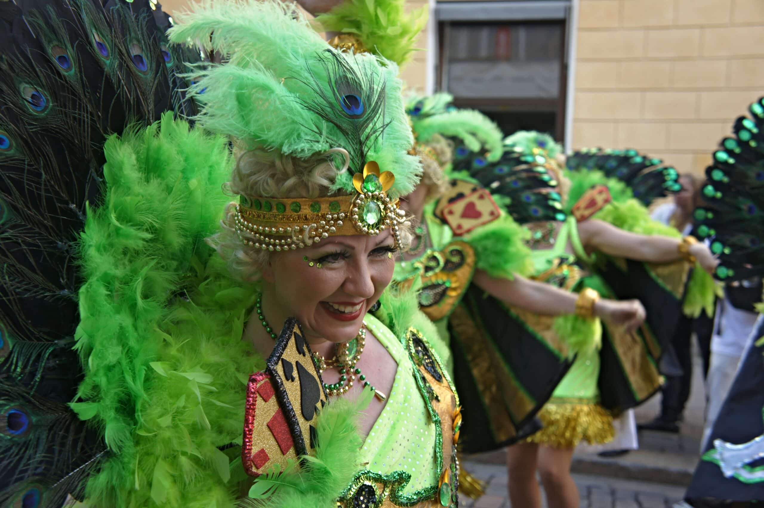 Brazil Samba costumes are worn by all ages, here you see a women full of smiles dressed in green
