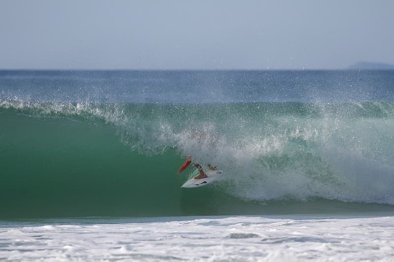Surfing the Waves While Traveling in Florianopolis Brazil 