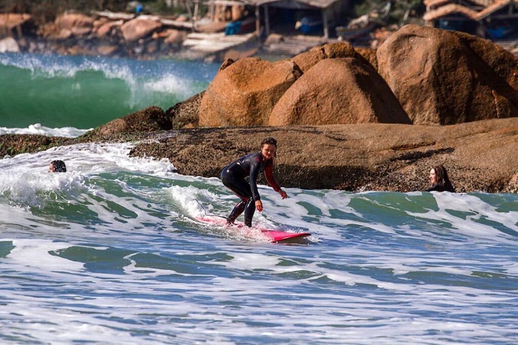 Florianopolis Weather: Photo surfing on the beach of Rosa Norte