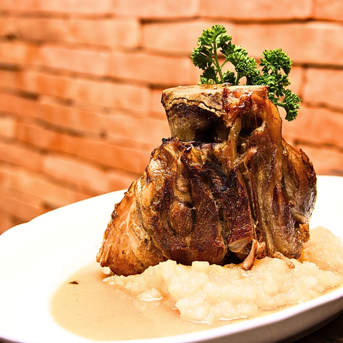Local Brazilians preparing pernil, a Christmas specialty
