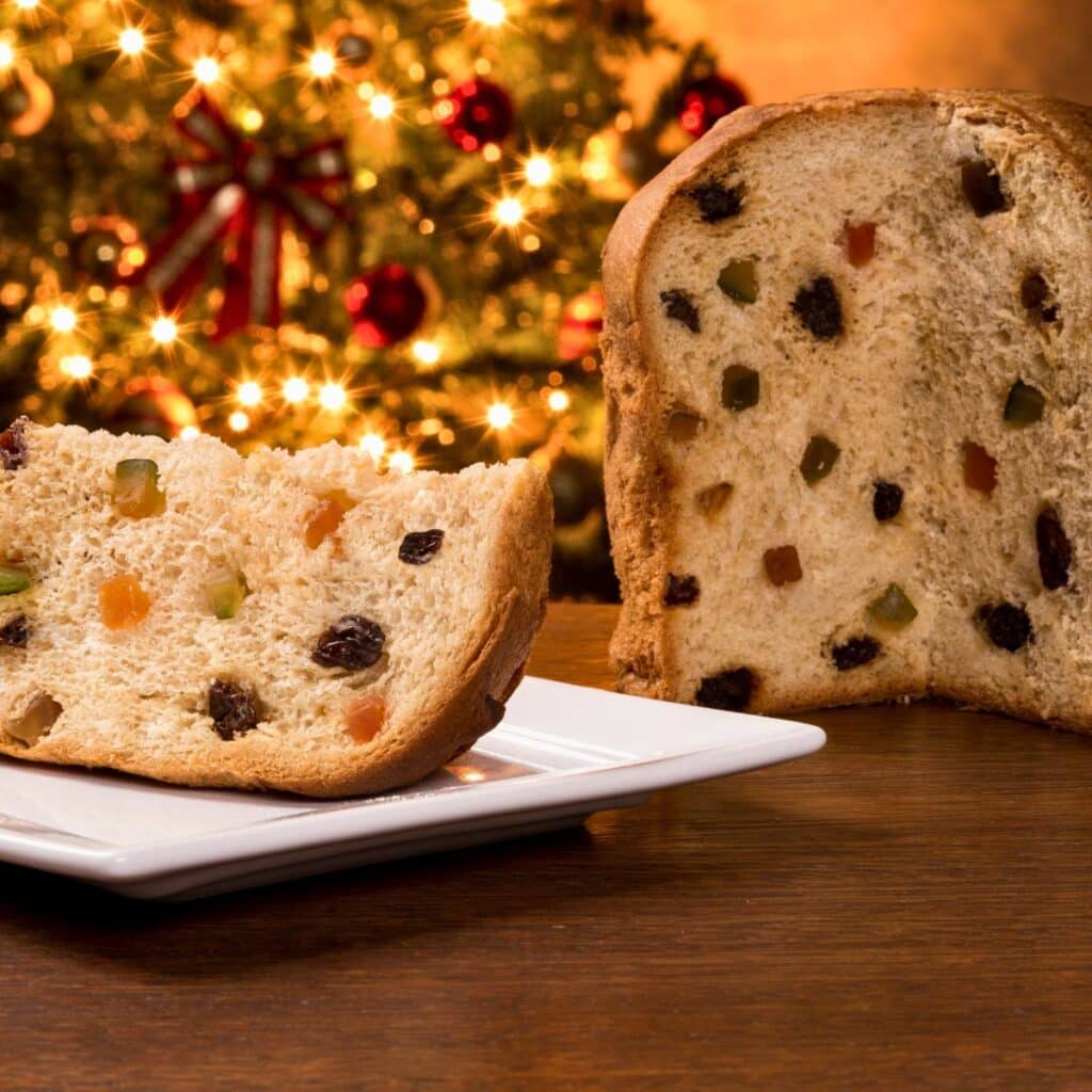 Homemade Brazilian Panettone, a holiday favorite with raisins and candied fruit, from our Christmas dessert spread.