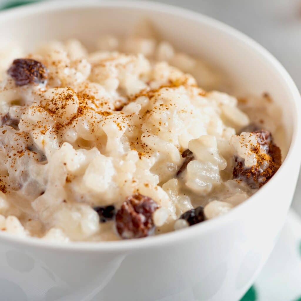 Festive Brazilian Rice with Raisins, a sweet and savory dish, served at our family’s Christmas dinner.